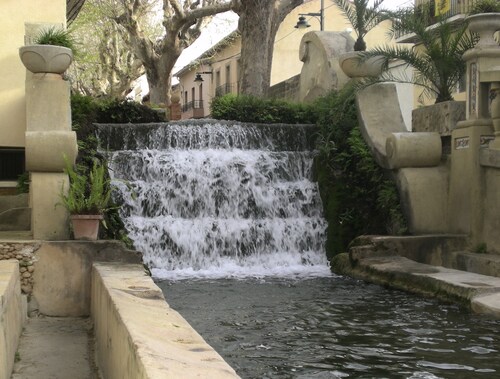 That impress patio overlooking mountains and the sound of water in the fountain