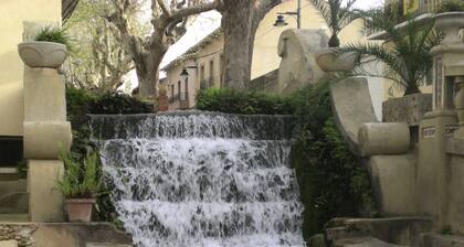 That impress patio overlooking mountains and the sound of water in the fountain