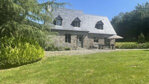 A stone building with a sloped roof and multiple windows. - Delightful House for Up to 6 Guests + Baby With Large Secluded Garden Area  (Fleury)