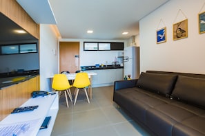 Apartamento, 1 quarto (Padrão) | Área de estar | TV de tela plana 40 polegadas com canais digitais, TV LED, Netflix