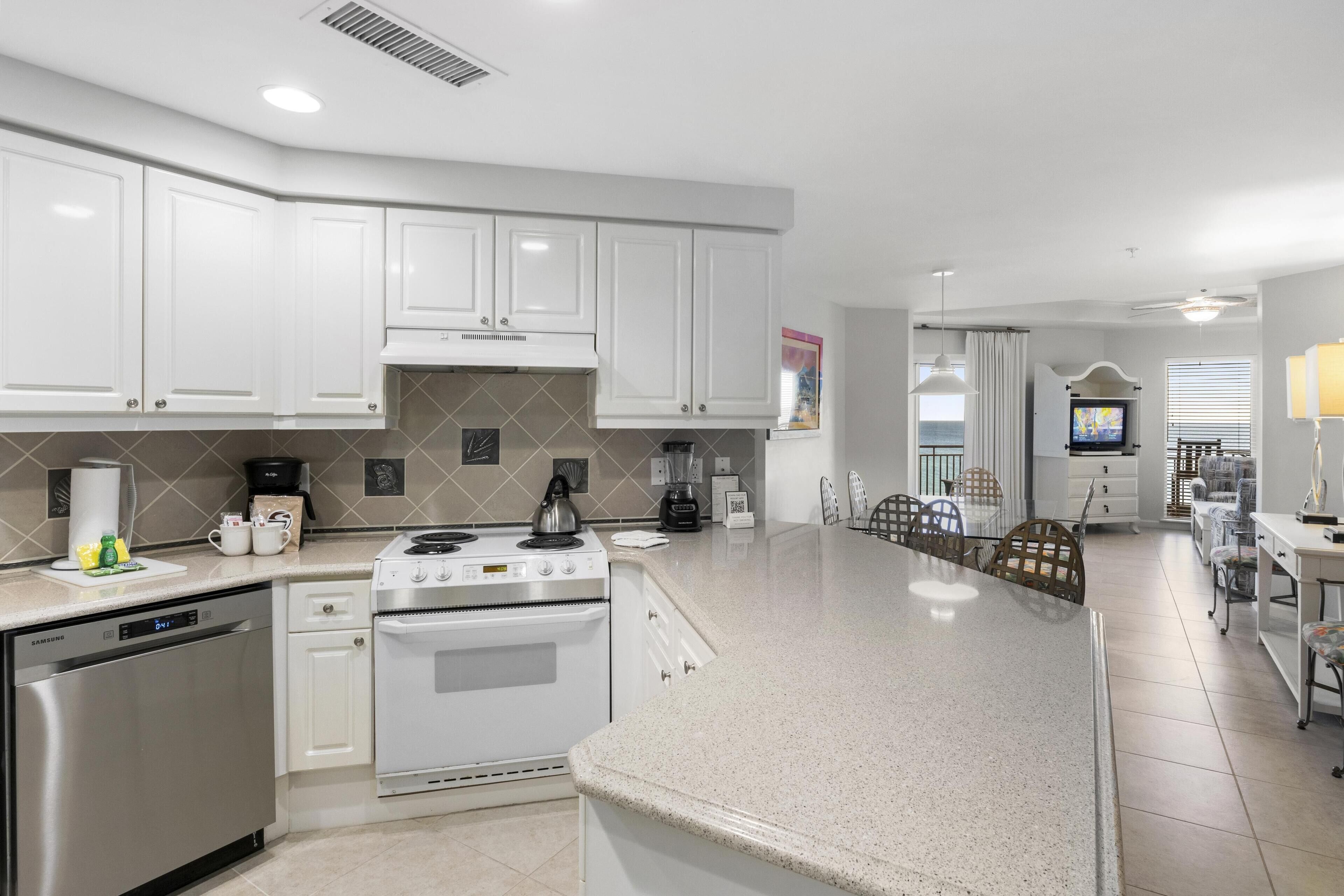 Coffee/tea maker, fridge, microwave, oven