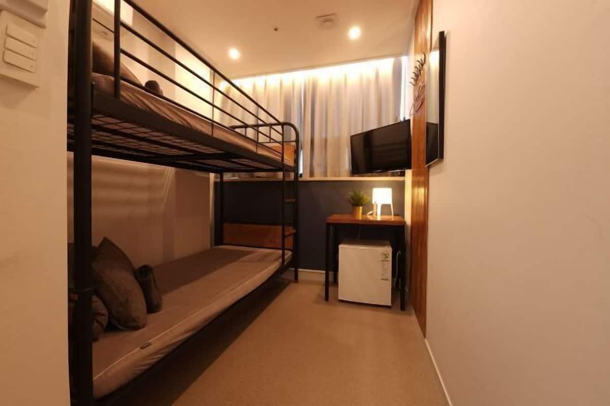 Desk, blackout drapes, soundproofing, iron/ironing board
