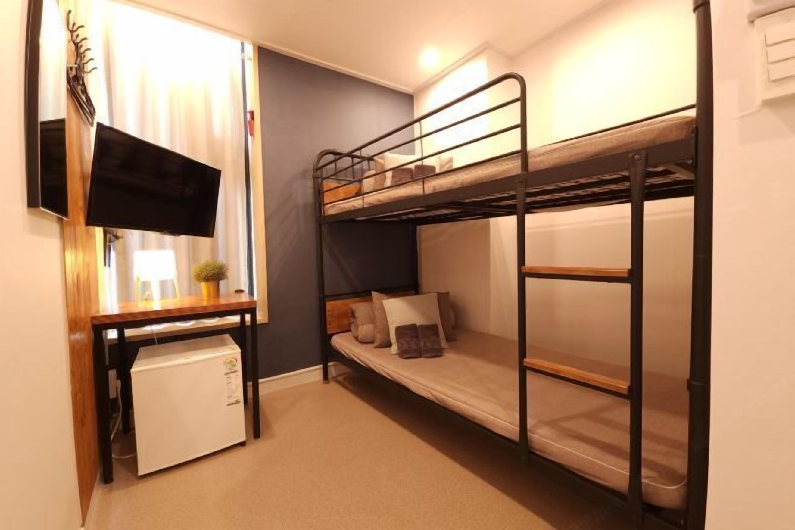 Desk, blackout drapes, soundproofing, iron/ironing board