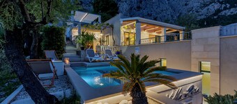 Holidayhome in a quiet location with pool&sea view, mini golf course& playground