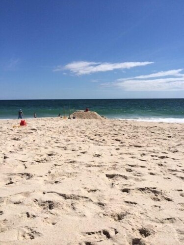 East Quogue Serene Lane con piscina decorada para cumplir con su estilo de vida Hamptons