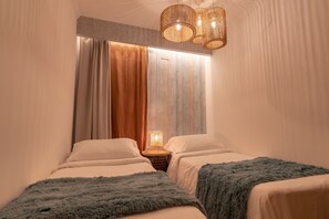 2 quartos, cofres nos quartos, ferros/tábuas de passar roupa