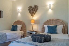 4 bedrooms, in-room safe, iron/ironing board, free WiFi