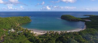 Half Moon Villa :- A beautiful villa with a large pool & garden, ocean views.