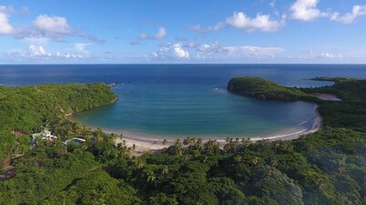 Half Moon Villa :- A beautiful villa with a large pool & garden, ocean views.