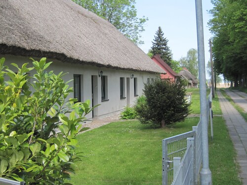 Vacation under the thatched roof on the backwater opposite the island of Usedom