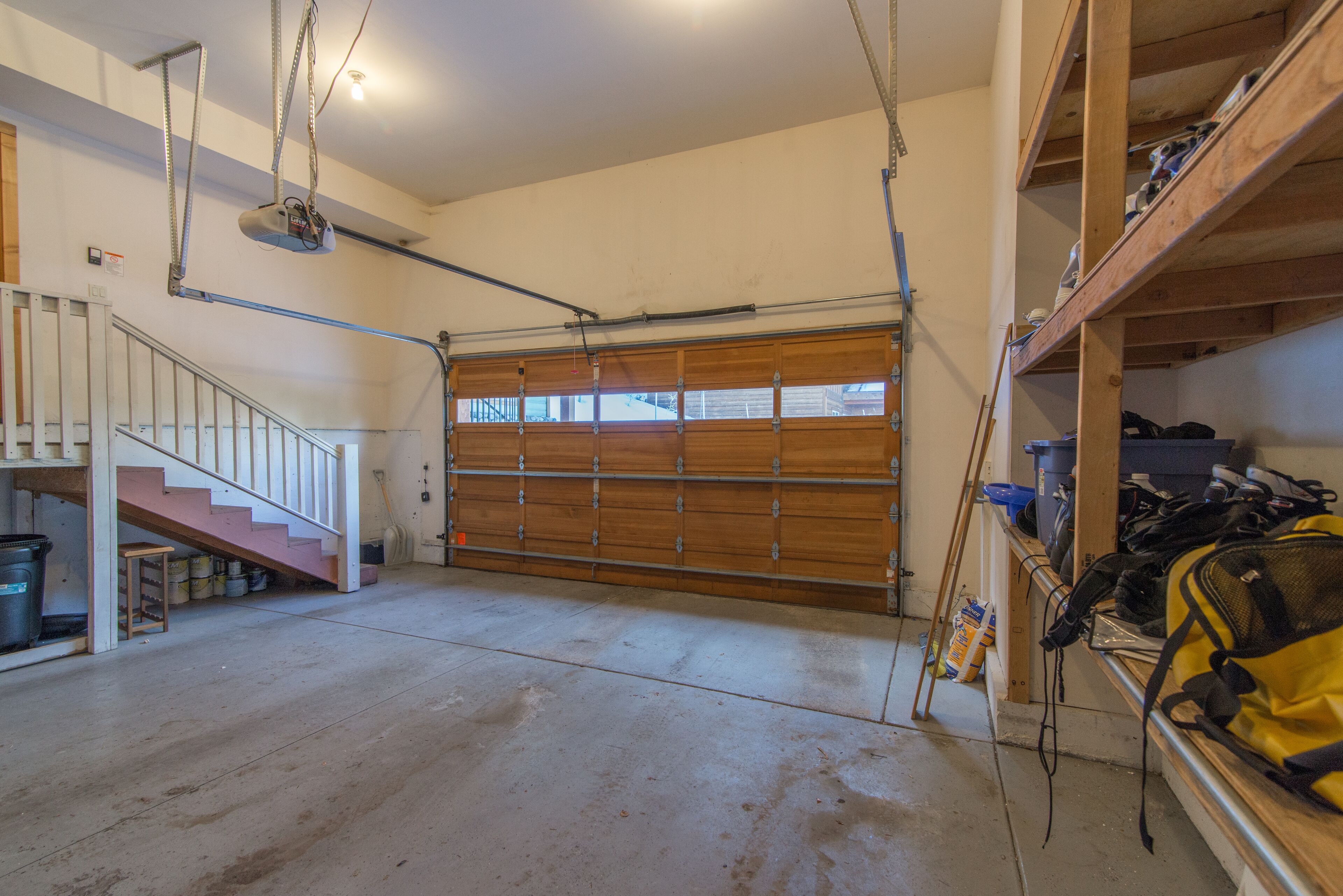 Garage is large enough to fit two SUVs. Plus plenty of storage for ski equipment