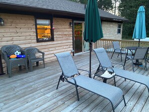 Outdoor dining - Private Lake House on 16 +/-  wooded acres, 80 + acre lake, 55 foot deep!! (Crystal Falls)