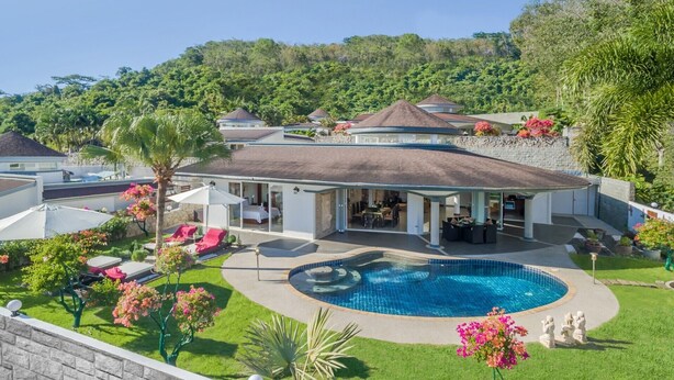 A resort with a swimming pool, outdoor seating, and lush greenery. - Luxurious, quiet, private Pool-Villa Jasmine, 7/7 housekeeper/butler (Phuket)