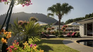 A resort with a pool, sun loungers, and a mountain backdrop. - Luxurious, quiet, private Pool-Villa Jasmine, 7/7 housekeeper/butler (Phuket)
