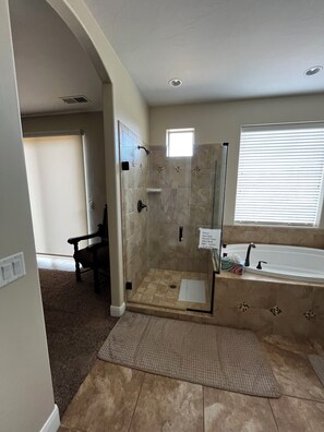 Combined shower/tub, hair dryer, towels, soap