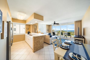 Enjoy ocean views from the balcony through the large sliding glass door.