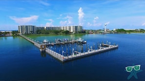 Stunning waterfront views of a marina with boats moored at the docks.