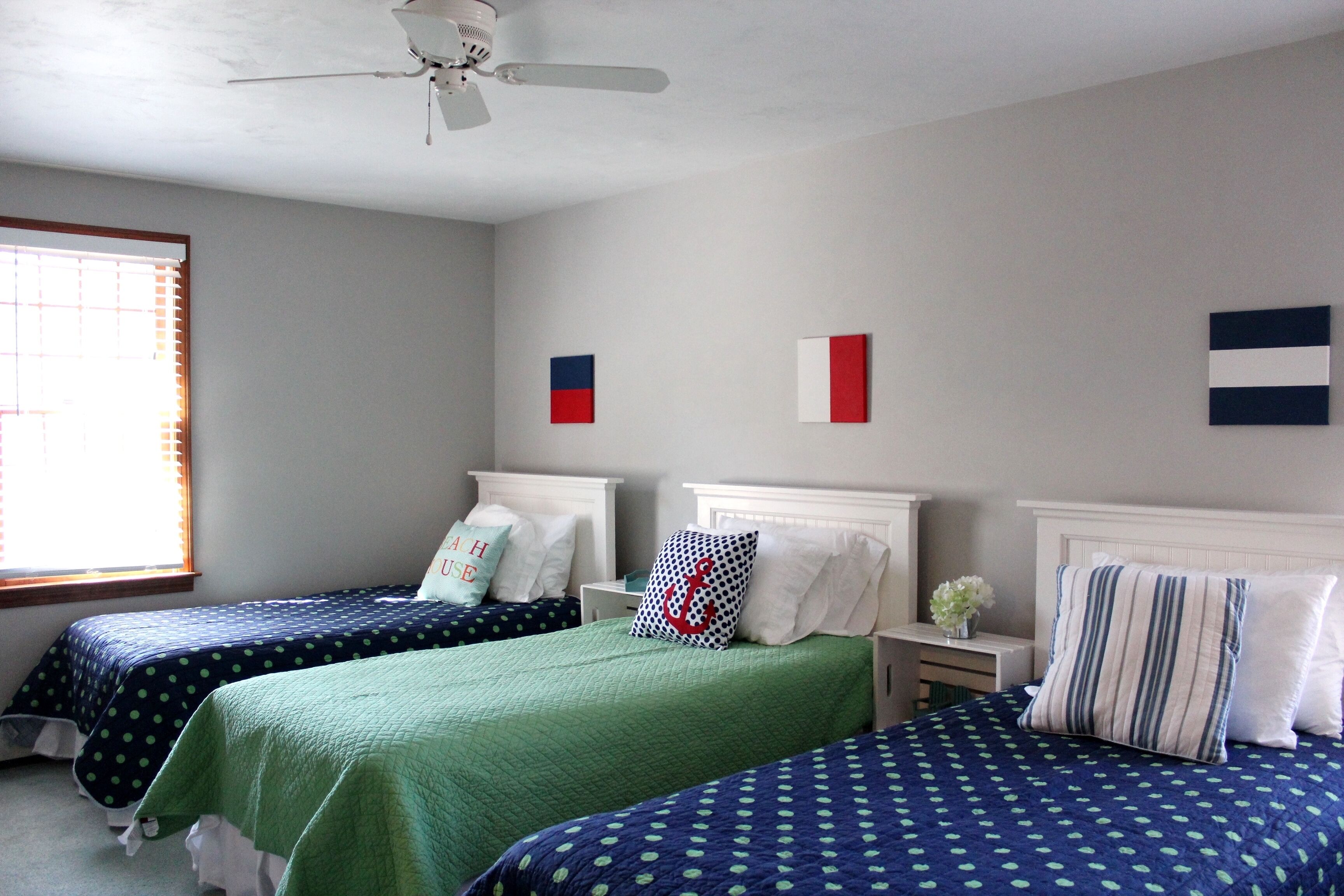 Spacious 2nd floor bedroom with 3 twin beds. Central AC