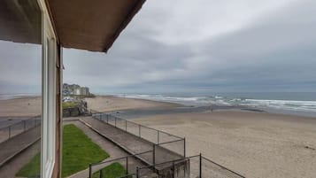 Enjoy breathtaking views of the ocean from this beachfront balcony.