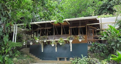Secluded retreat with lush landscaped gardens where nature takes center stage.