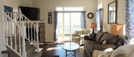 TV, fireplace, books