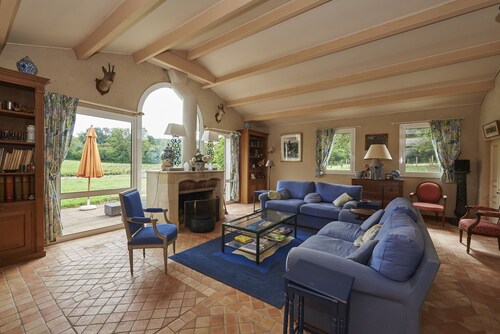 Cottage House with view on a castle