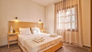 2 bedrooms, in-room safe, iron/ironing board, travel cot