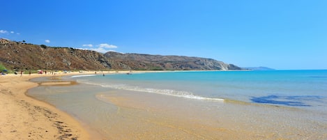 En la playa y toallas de playa