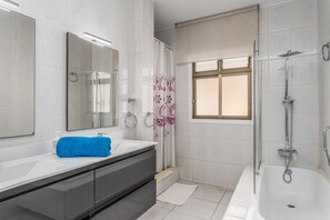 Hair dryer, towels, soap, toilet paper