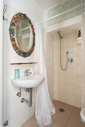 Shower, eco-friendly toiletries, hair dryer, bidet