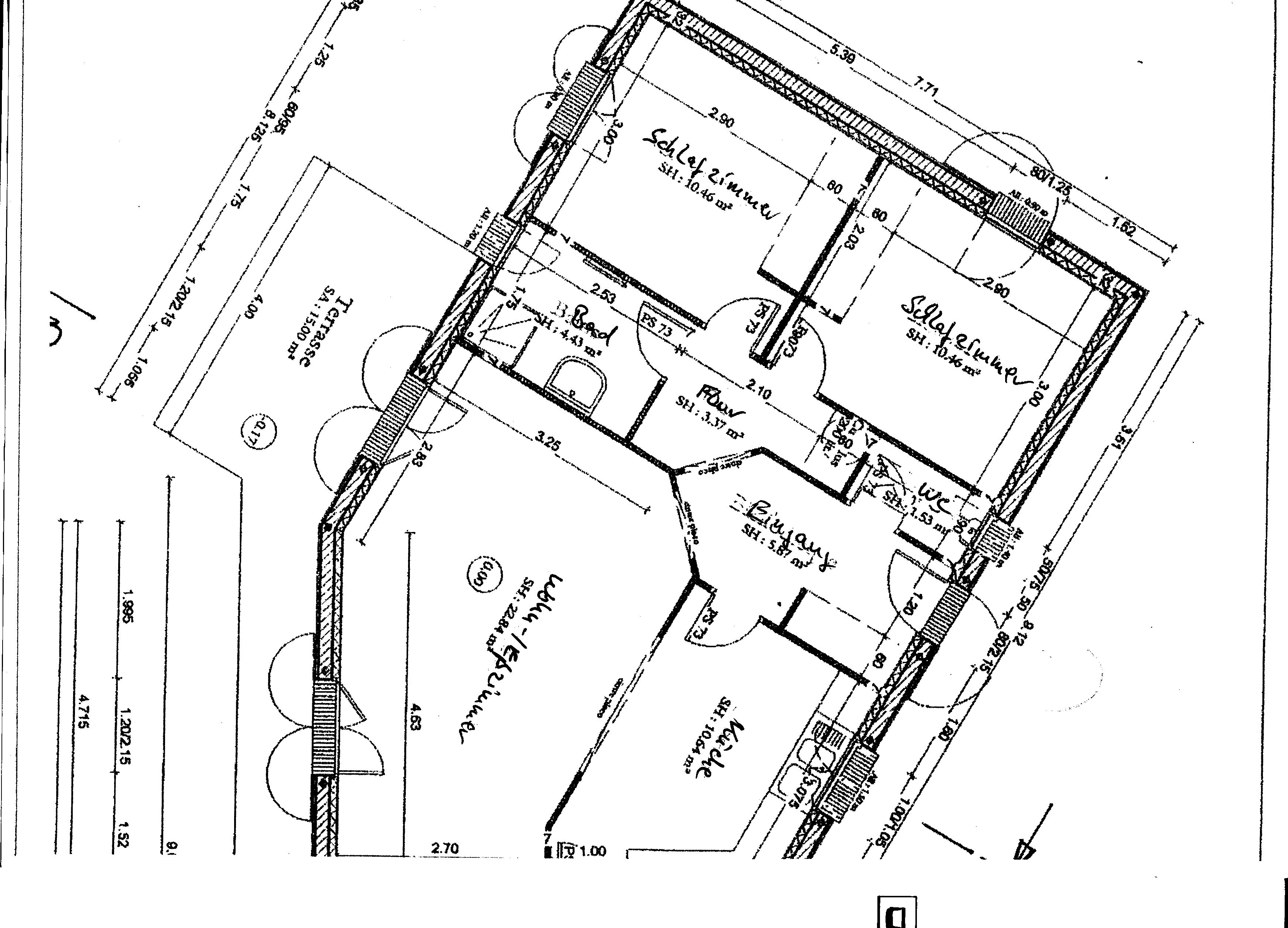 A detailed architectural floor plan of a building with multiple rooms, including labeled areas such as "Schlafzimmer" (bedroom) and "WC" (WC).