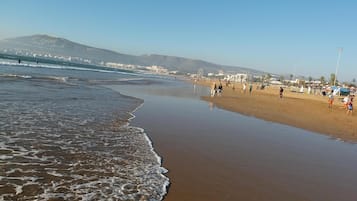On the beach, beach towels