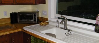 Cozy apartment overlooking our small farm.  Family Friendly.