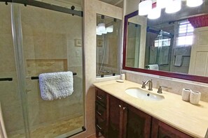Shower, towels, soap, toilet paper