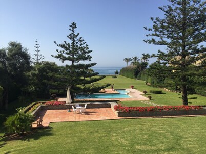 Private villa in exclusive area, with pool, tennis and direct  access to beach