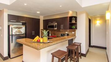 Fridge, microwave, stovetop, coffee/tea maker