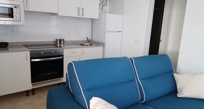 Wohnung mit eigenem Garten und Terrasse mit Blick auf den Pool und am Strand