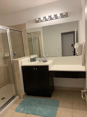 Combined shower/tub, hair dryer, towels, soap