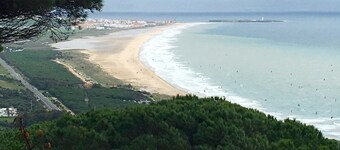Large and charming house next to Playa de Los Lances (with garden and parking). 