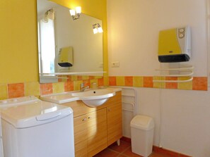 Regadera y secadora de cabello