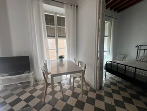 1 bedroom, desk, iron/ironing board, travel crib