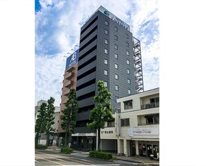 A multi-story hotel with a modern design, featuring a prominent 'Hotel LiveMax' sign on the top. - HOTEL LiVEMAX Gifu-Ekimae (Gifu)