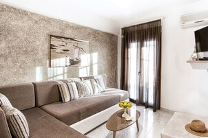 Superior Apartment (Crystal and Pearl) | Living area | 32-inch flat-screen TV with satellite channels, TV, DVD player