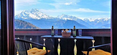 Mountain panorama with a view of the valley, totally alpine pasture landscape