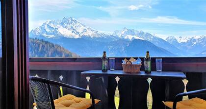 Mountain panorama with a view of the valley, totally alpine pasture landscape
