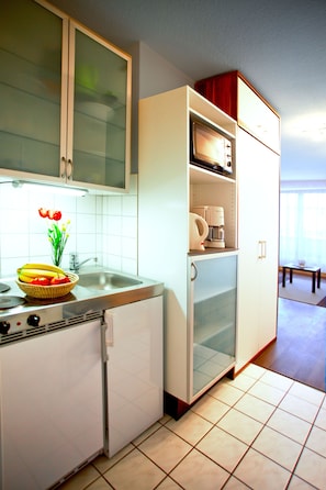 Microwave, stovetop, coffee/tea maker, toaster