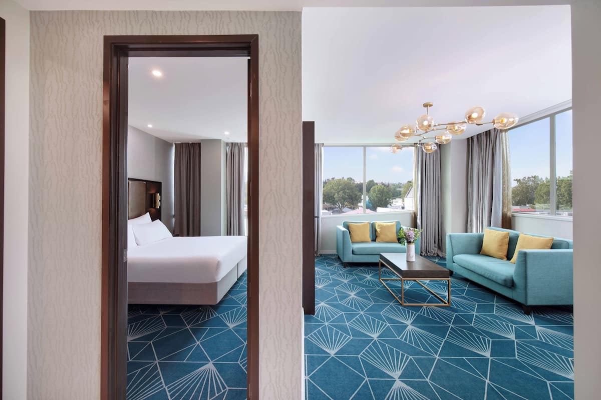 Swiss-SuperSuite Two Bedroom | Living area | Flat-screen TV