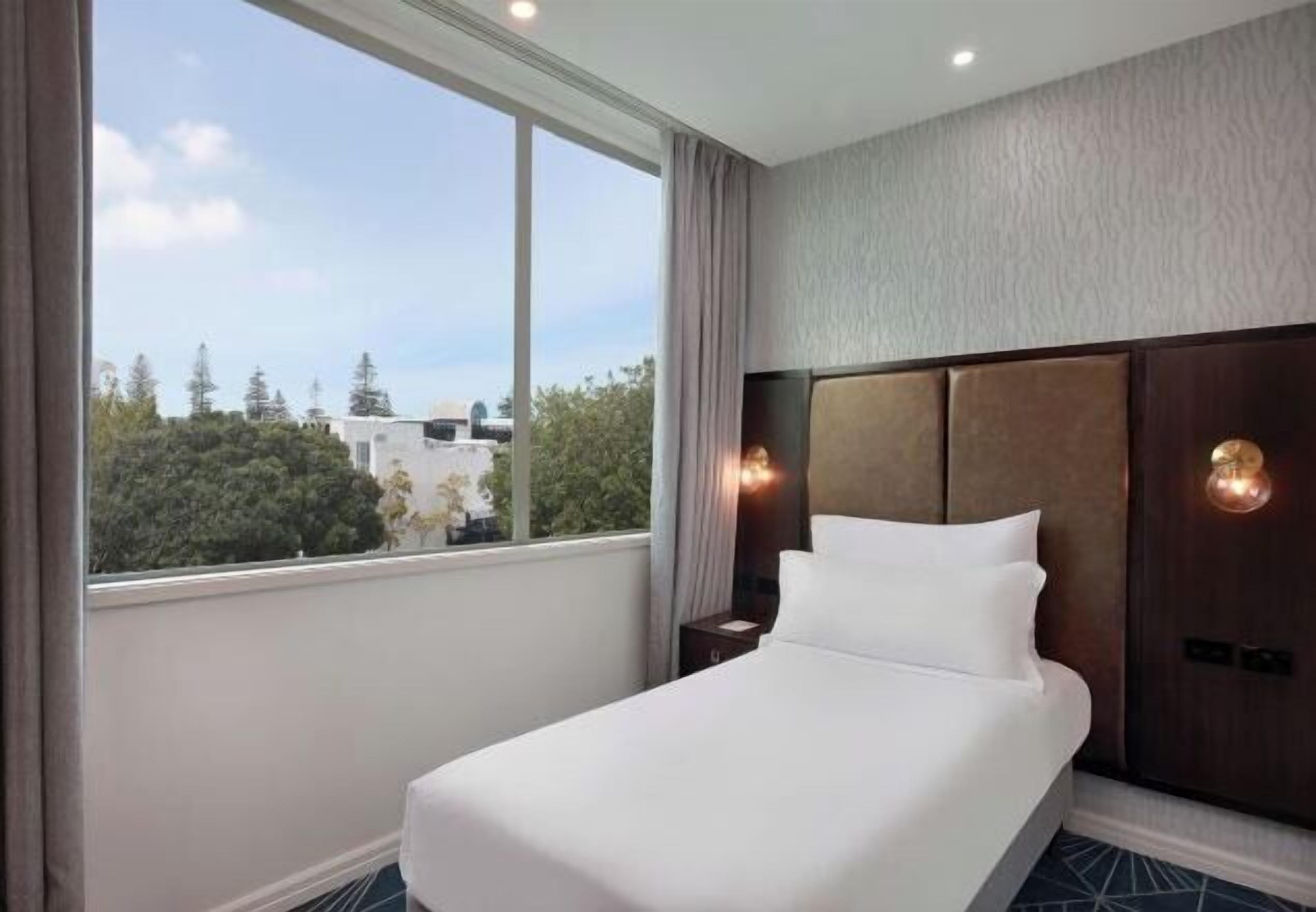 Literie de qualité supérieure, coffres-forts dans les chambres