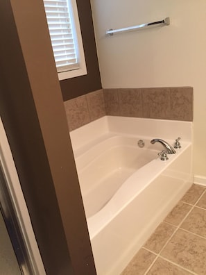 Combined shower/tub, hair dryer, towels, soap