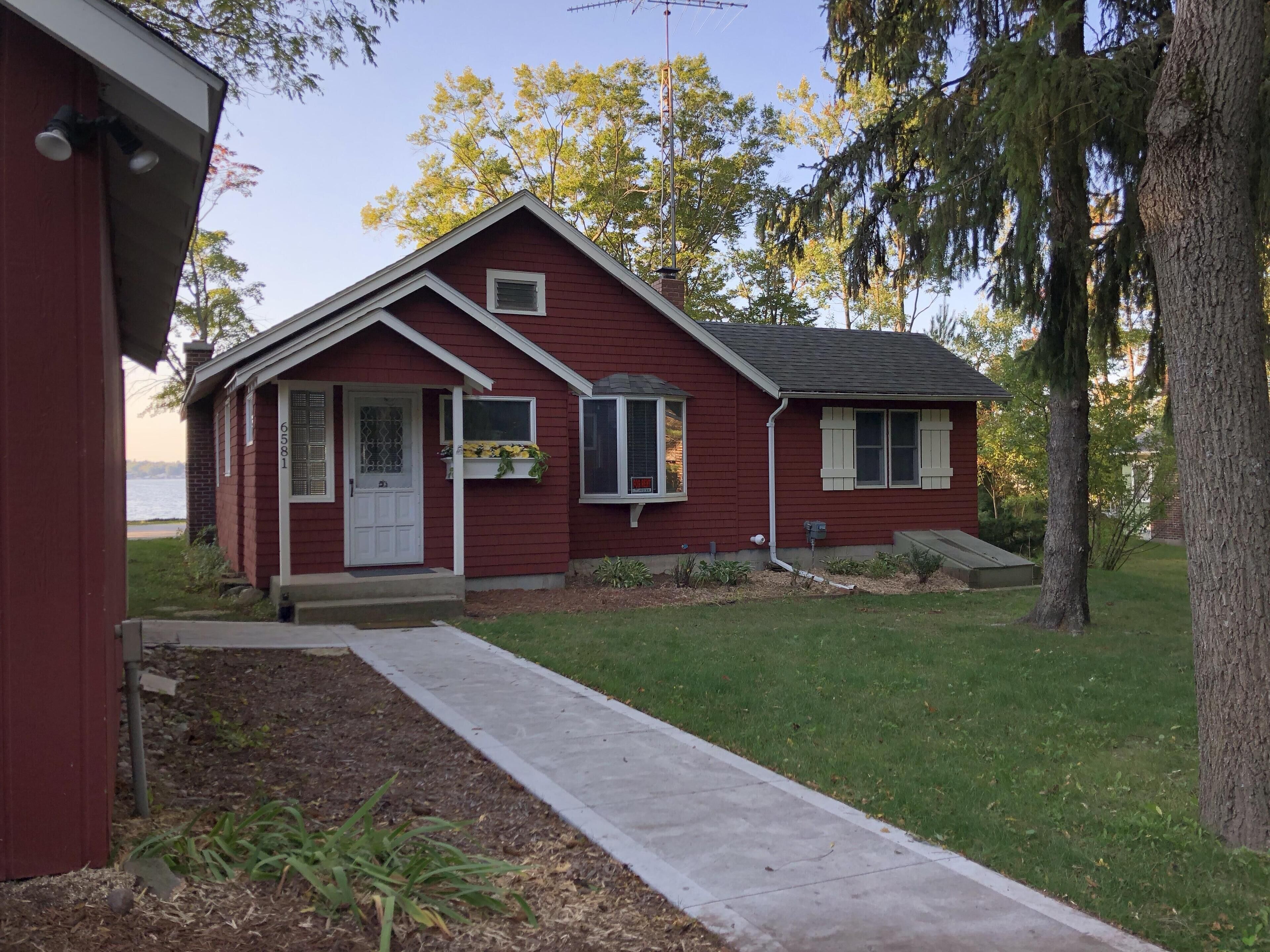100 ft lakefront on Bear Lake, close to Crystal Mountain and Arcadia Bluffs